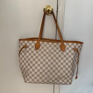 Louis Vuitton Neverfull Damien Azur Tote in white.